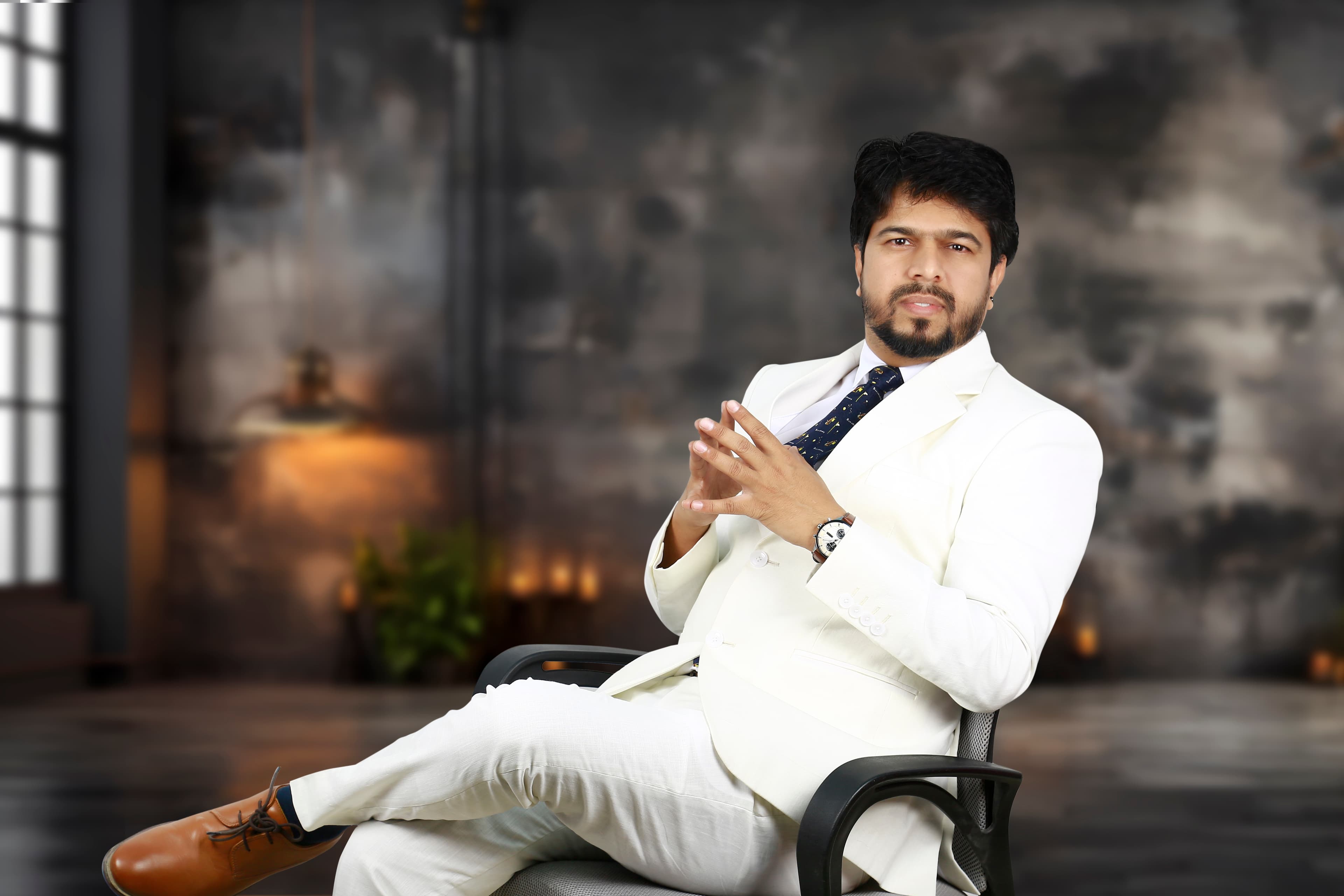 Kiran Wagh, an export-import expert, sitting in a chair